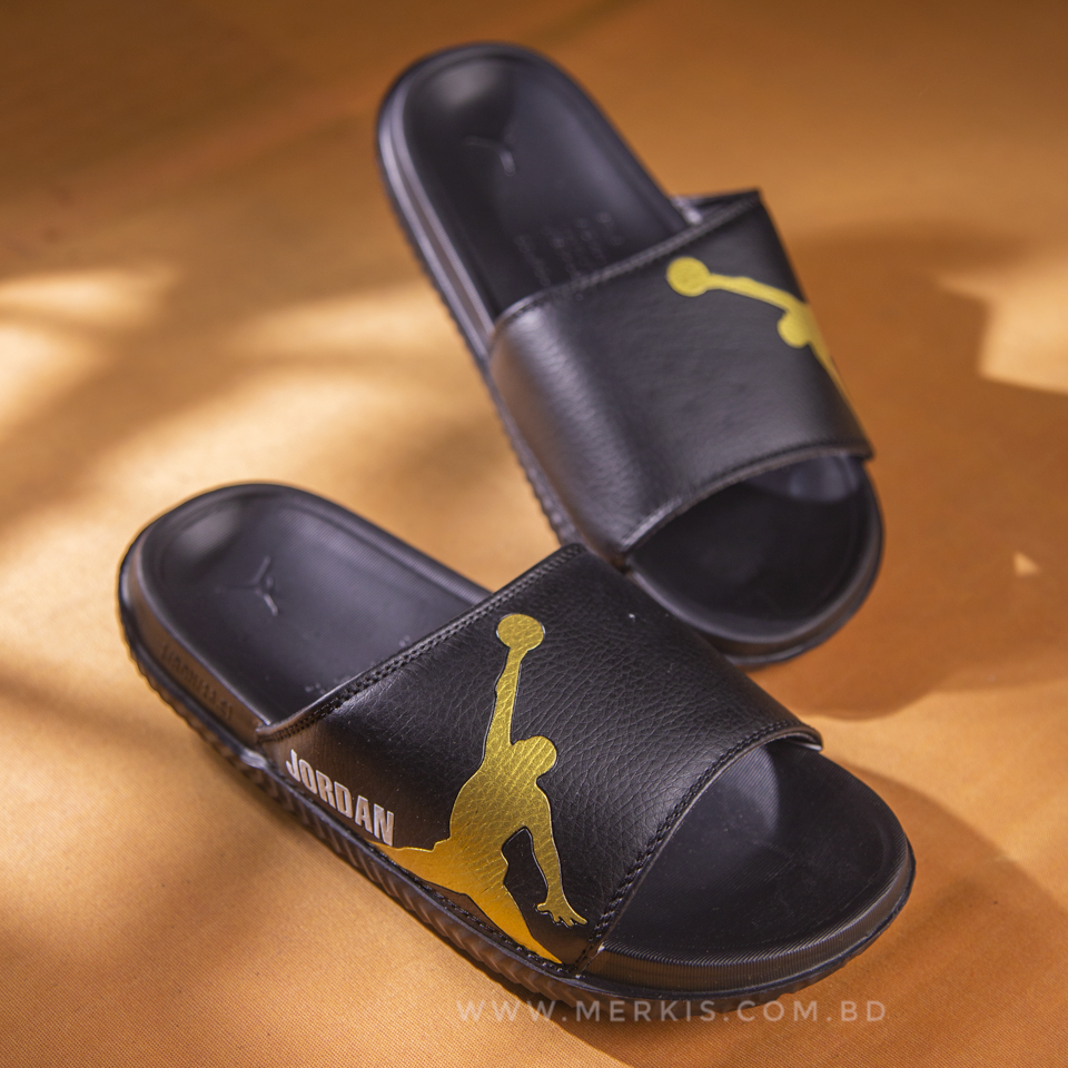 Black and hotsell gold jordan slides